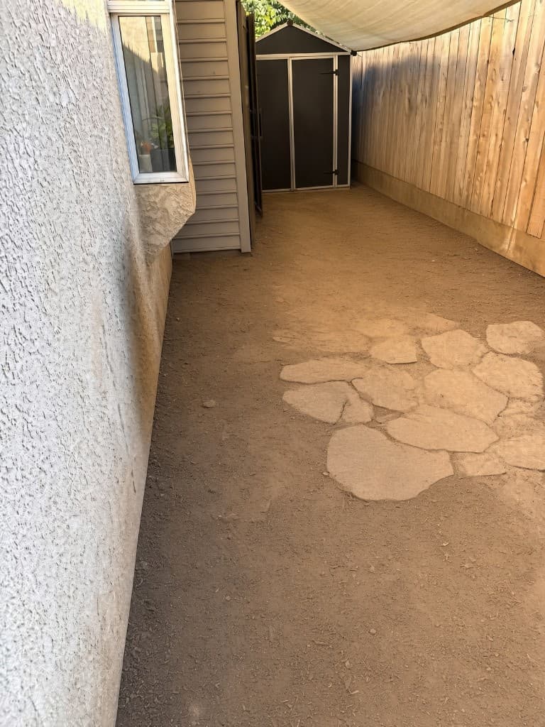 Cleared Fresno side yard after junk removal and property cleanup